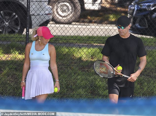 Back in the love game?  Michael Clarke was spotted on the tennis court with coach Silvia Kramska on Tuesday following his very messy divorce from Jade Yarbrough