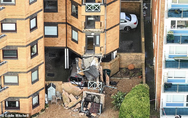 Two balconies collapsed and a car crushed at a residential block as shocked residents held an early Christmas celebration