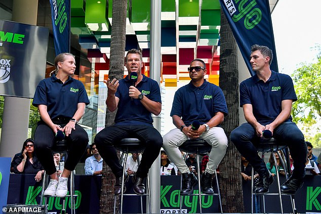 Cummins and Warner are pictured at an event in Sydney on Friday with fellow cricket stars Alyssa Healy and Usman Khawaja