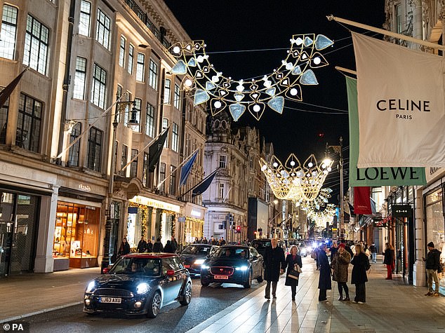 Best foot forward: Bond Street, London's chicest shopping street, is putting on a dazzling show this Christmas