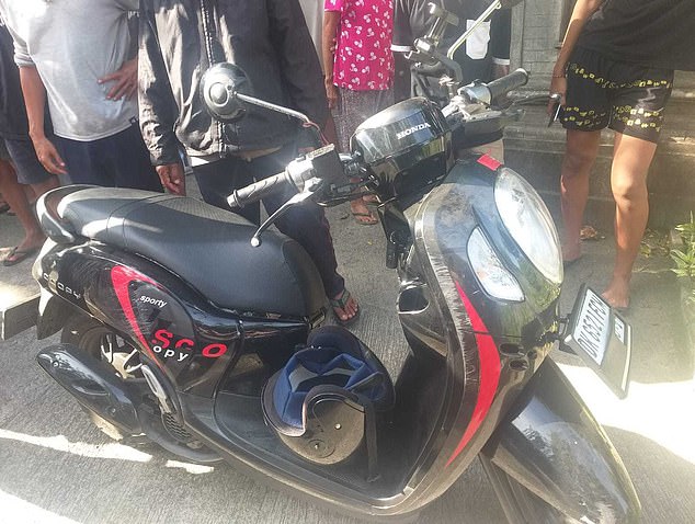 He was hit by another motorcycle while riding a Honda Scoopy (pictured) along the Persinggahan Highway near the border of KlungKung and Karangasem regencies, on the southeastern coast of the Indonesian island, around 3:30 p.m.