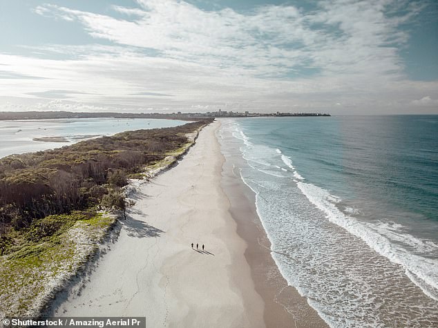 Emergency services rushed to Bribie Island where a man fell into a hole and became buried in the sand