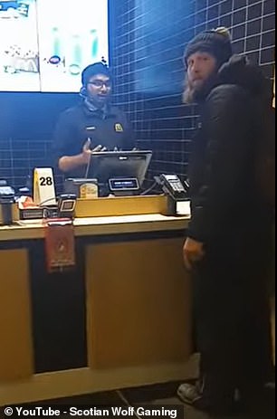 The man who complained about his order turned away at one point while he was being filmed