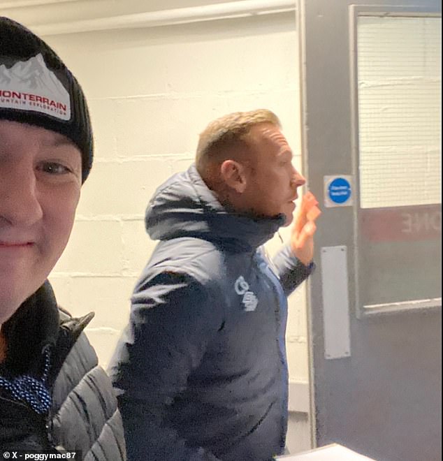 The traveling Everton supporter even asked Burnley assistant Craig Bellamy for a selfie