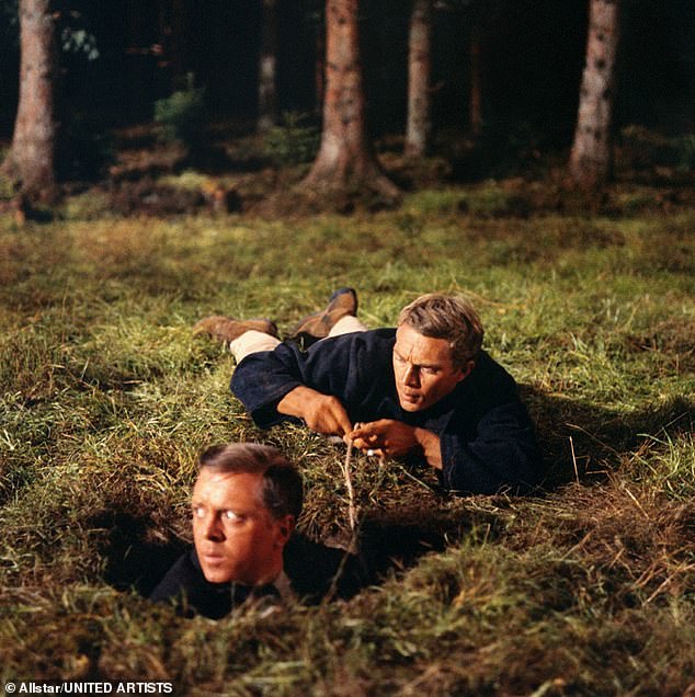 As a prisoner of war, Lieutenant Butterworth was not only deeply involved in organizing the famous Great Escape from Stalag Luft III, but also played a crucial role in passing coded messages to British intelligence in seemingly innocent letters home.  Pictured are Richard Attenborough and Steve McQueen in the film The Great Escape