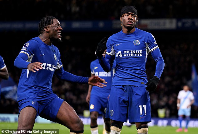 Noni Madueke (R) turned up to score a late penalty to give Chelsea three points