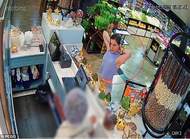 A Brazilian supermarket security camera captured Amanda Partata shopping for the food she allegedly poisoned and fed to her ex-boyfriend's father and grandmother on Sunday, hours before they both died.  Partata was arrested on Wednesday