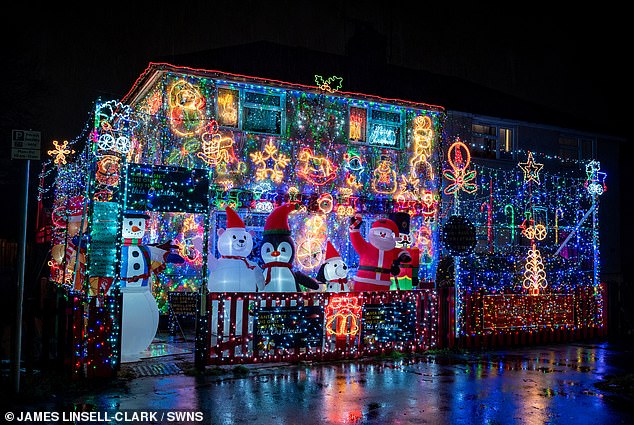 This year the exhibition consists of an eight-foot gingerbread man, a nutcracker and a Christmas tree.  He also covered the house with a blow-up Santa Claus, penguin, polar bear and a 6-foot reindeer and dog