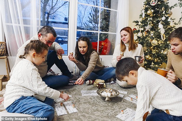 For many families, Christmas isn't complete without a series of terrible jokes and trivia questions.  But if you're tired of settling for the Christmas cracker offering, split into teams this year and turn on your quiz brain (stock photo)