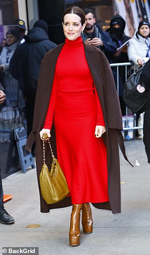 The actress was later spotted leaving the studios in a chic red ensemble