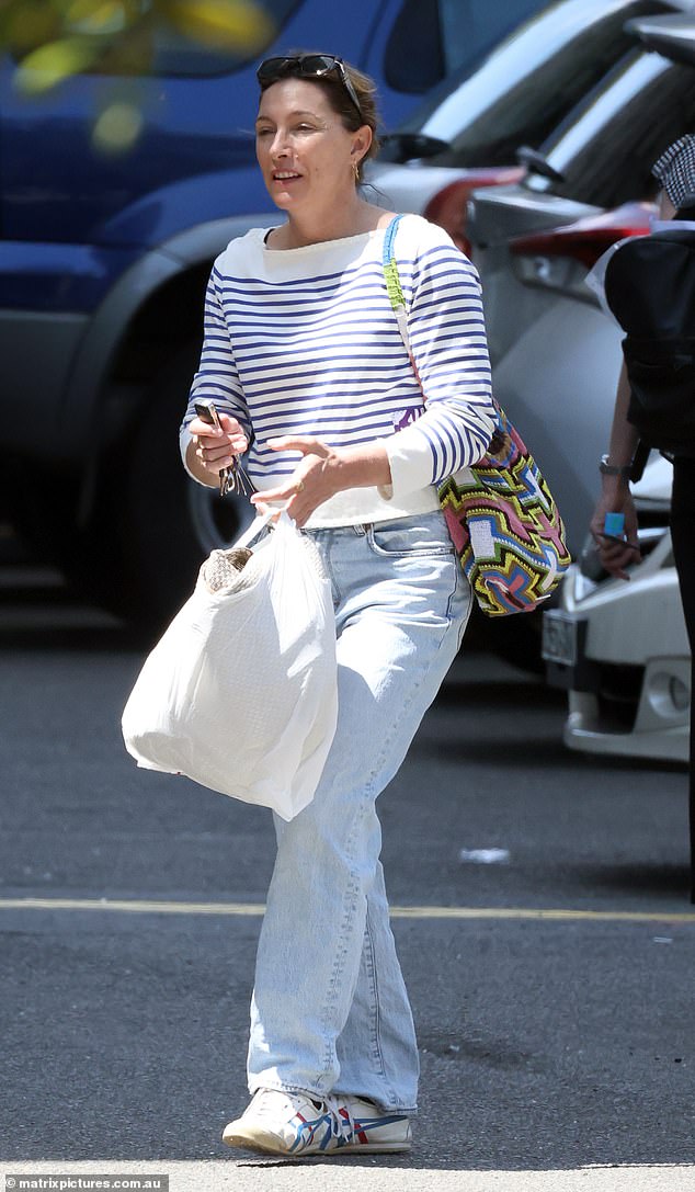 Dressed in a striped blue and white sweater and jeans, the Bump actress looked effortlessly chic as she strolled with car keys in hand