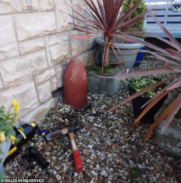 A bomb used as a garden ornament (pictured) was detonated by a recovery unit