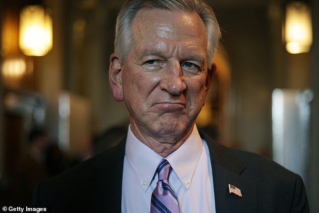 Sen. Tommy Tuberville of Alabama said he had a hold on 11 four-star generals but would lift his hold on about 400 military promotions after a nearly 10-month blockade.