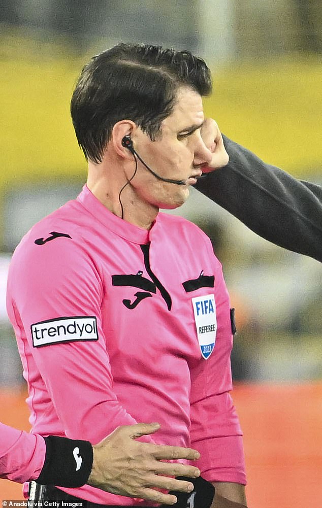 The moment Faruk Koca's fist hits referee Halil Umut Meler's face after a Turkish Super Lig match on Monday