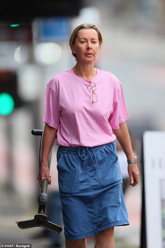 Dejected Deborah Knight stepped out for a walk in Sydney on Saturday after being banned from 2GB radio