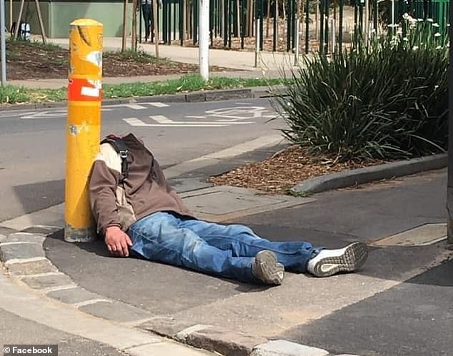 The medically supervised injection room provides a legal loophole for drug users as police cannot make drug-related arrests within 300 meters (photo: a man lying on the street opposite the MSIR)