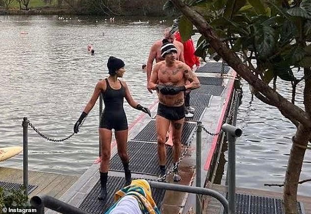 Harry Styles showed off his ripped physique as he enjoyed a cold dip in Hampstead Heath swimming ponds with his girlfriend Taylor Russell, in a snap shared by a fan on Instagram