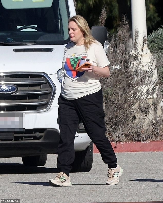 Elisabeth Moss cut a demure figure as she stepped out in LA on Thursday