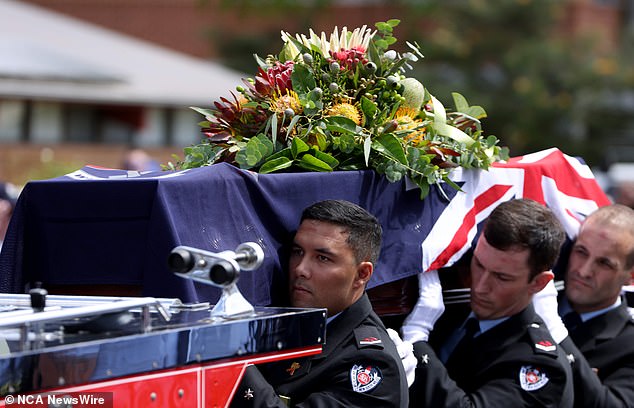 Firefighter Michael Kidd was buried (pictured) in Sydney's northwest on Friday after dying while battling a fire that engulfed a suburban home last week