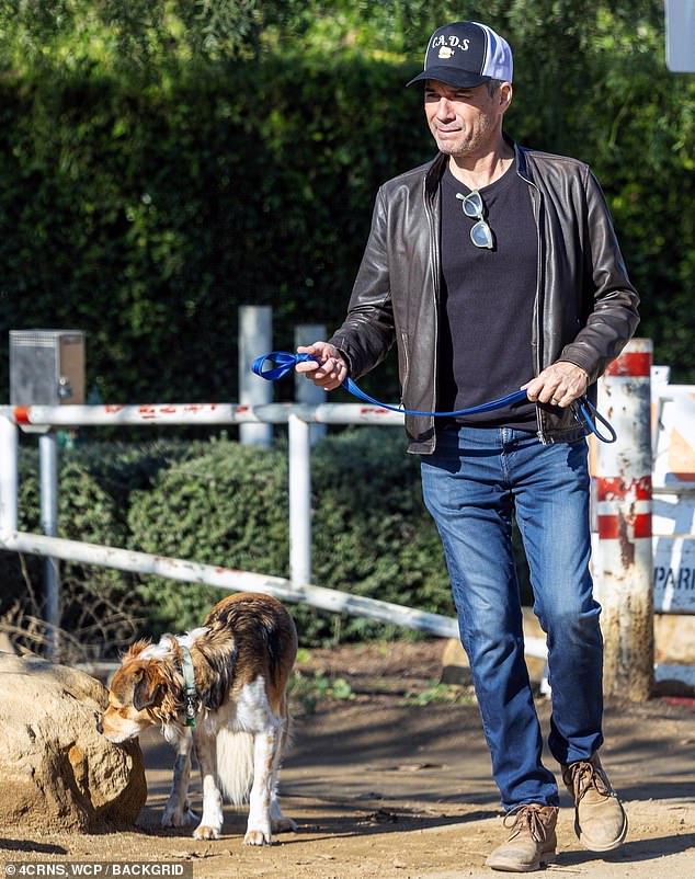 Eric McCormack was spotted taking a walk with his dog through the hills of Los Angeles on Sunday afternoon