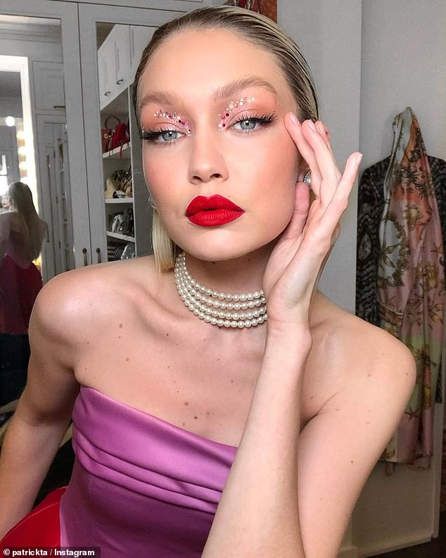 If you really want to get into the spirit of the season, you might want to amp up your glam with a little glitter, à la Gigi Hadid