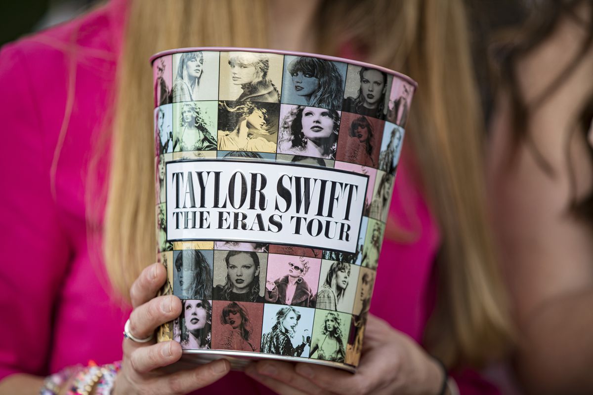 A photo of a popcorn bucket at the movie premiere of “Taylor Swift: The Eras Tour.”