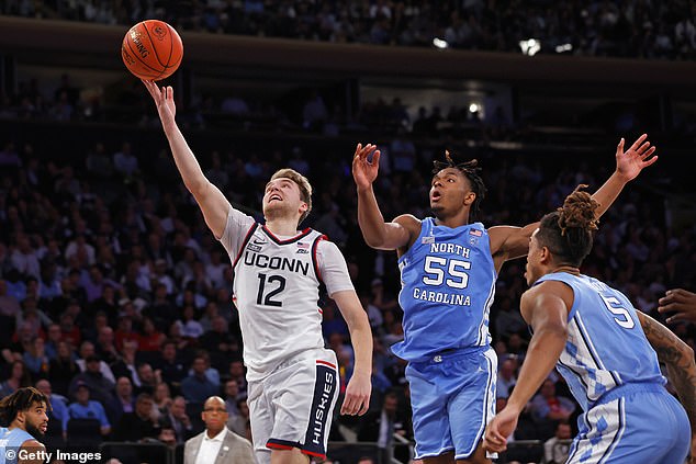 UConn's Cam Spencer (12) led the fifth-seeded Huskies to a dominant win over North Carolina