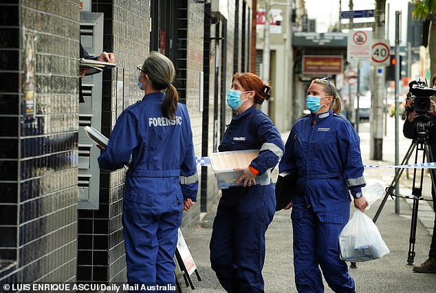 A 12-year-old girl is alleged to have stabbed a 37-year-old woman to death at the former Royal Hotel pub-turned-hostel and apartments in Footscray on November 16 (pictured, forensics on site)