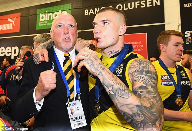 Hunt's wife Lynne confirmed her husband's condition on Wednesday (he is pictured left, with Richmond superstar Dustin Martin after the Tigers won the 2017 AFL Grand Final