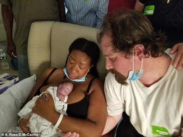 Parents, Alana Ross and Daniel McCarthy, hold their premature baby Everleigh Victoria before she sadly passed away on August 6, 2020 at Brigham and Women's Hospital.  The parents have filed a lawsuit against the hospital over the loss of their baby's remains