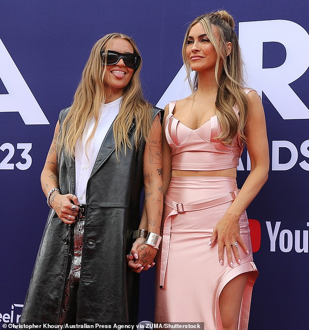 They got married secretly only seven months ago.  And now, non-binary pop singer G Flip is ready to settle down with their Selling Sunset partner Chrishell Stause.  Both shown