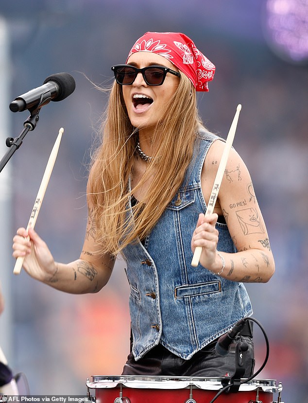 G Flip, 30, (pictured) set the stage on fire during the pre-game entertainment at the 2023 AFLW Grand Final on Sunday