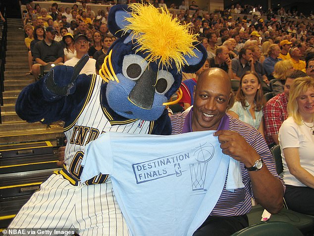 George McGinnis has fun with the Indiana Pacers mascot in April 2004 in Indianapolis