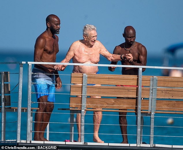 The 93-year-old was spotted swimming with a large entourage on a beach in Bridgetown, the island country's capital