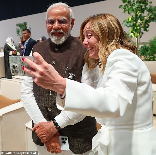 Giorgia Meloni was pictured taking a selfie with Italian Prime Minister Narenda Modi during COP28
