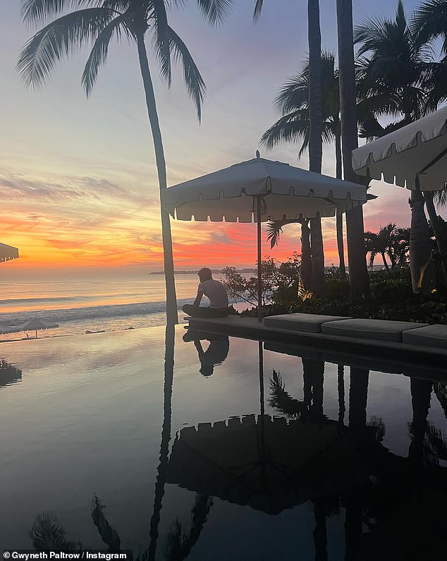 Gwyneth treated her fans to a picturesque view of the sunset behind an infinity pool