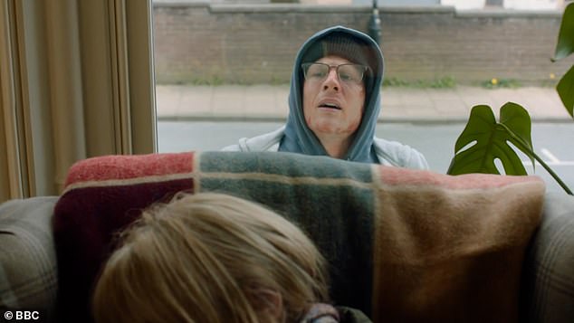 James Norton's Tommy Lee Royce peers into the home of Sergeant Cawood, played by Sarah Lancashire, as she dozes in an armchair