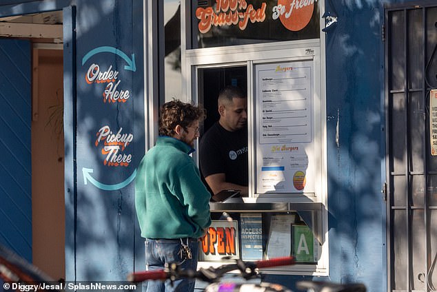 DailyMail.com spotted the first stopping to grab a burger and a beer in Los Angeles