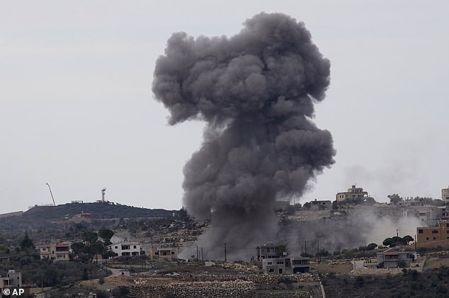 Black smoke rises from an Israeli airstrike on the outskirts of Aita al-Shaab, a Lebanese border village with Israel in southern Lebanon, Monday, November 13, 2023