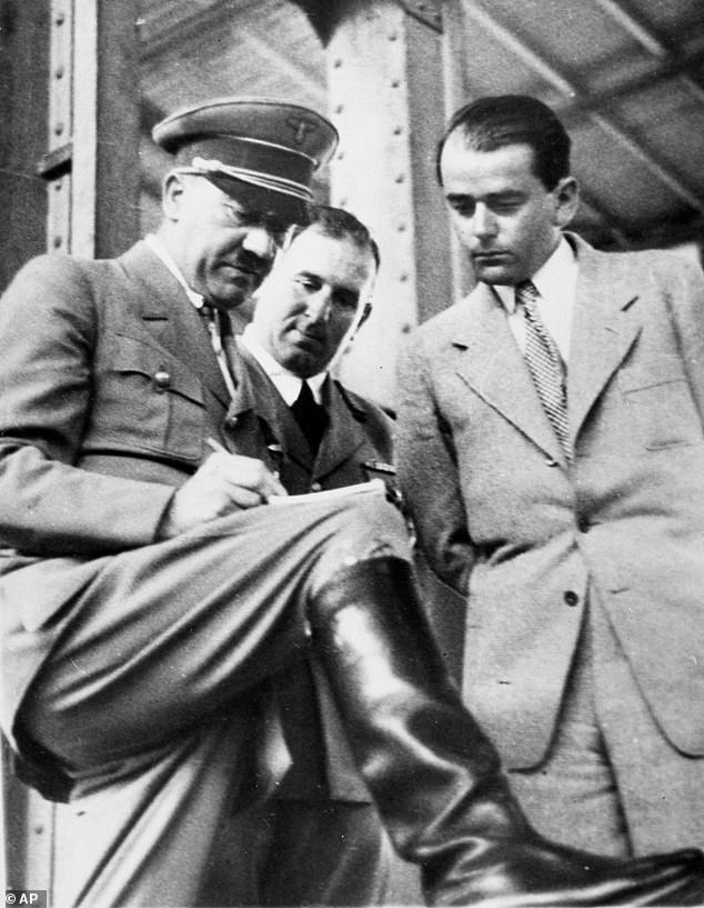 Albert Speer was the self-proclaimed 'good Nazi', the man who cleared his reputation despite spending years at Adolf Hitler's side.  Above: Speer (right) with Hitler in 1937