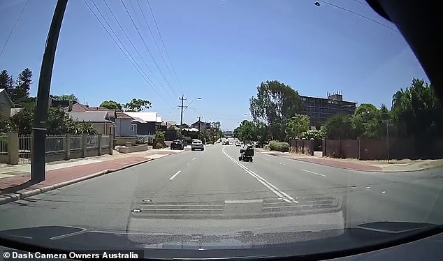 The scooter driver was seen crossing two lanes of the busy road before slowing down at the double lines