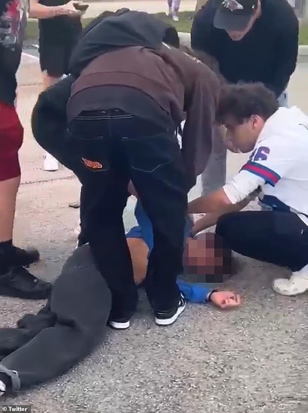 Horrifying footage has emerged of the moment a Marjory Stoneman Douglas student was brutally hit in the head during a brawl