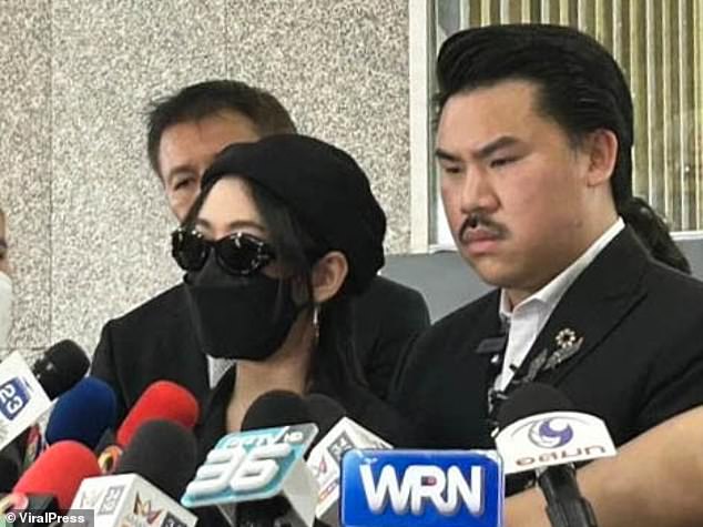 Game (left wearing mask) and her friend sought the help of a Thai celebrity lawyer Guntouch Pongpaiboonwet (seen right), also known as Gun Jompalang, who joined them in filing a case against the clinic, who they claimed refused to to take responsibility for what happened