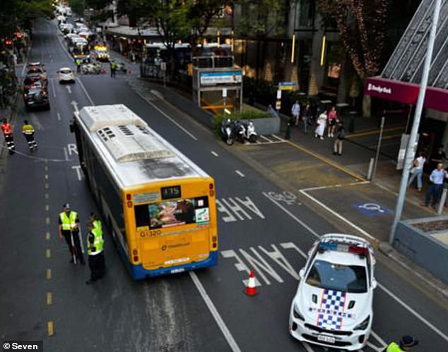 A 21-year-old was hit by a bus on Brisbane City's Adelaide Street just before 3pm on Thursday