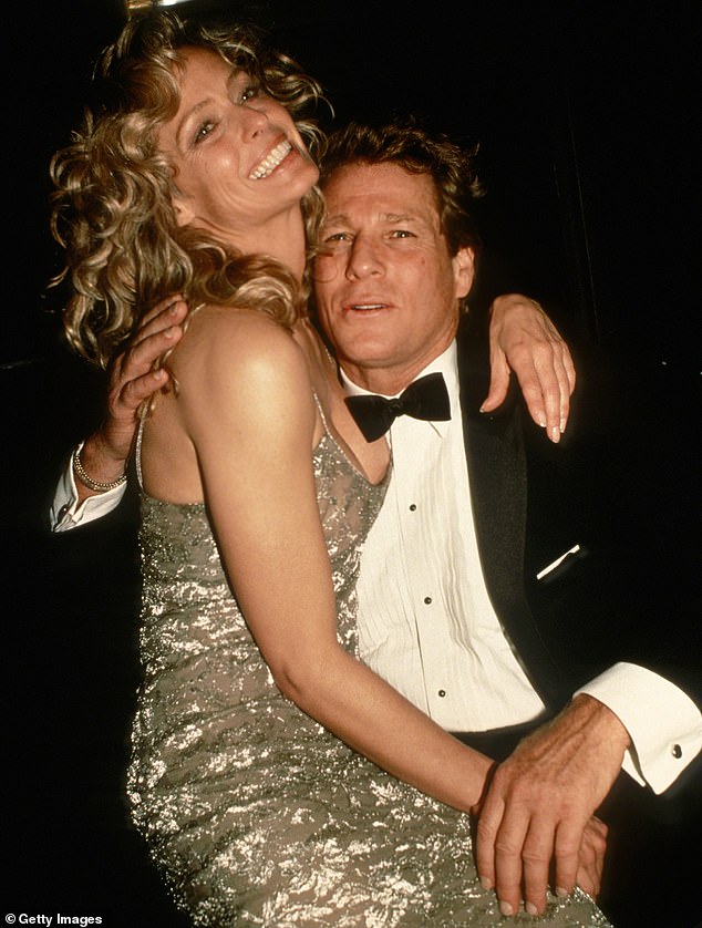 None of Ryan O'Neal's relationships captured the public imagination as much as his rollercoaster romance with blonde bombshell Farrah Fawcett;  pictured 1989