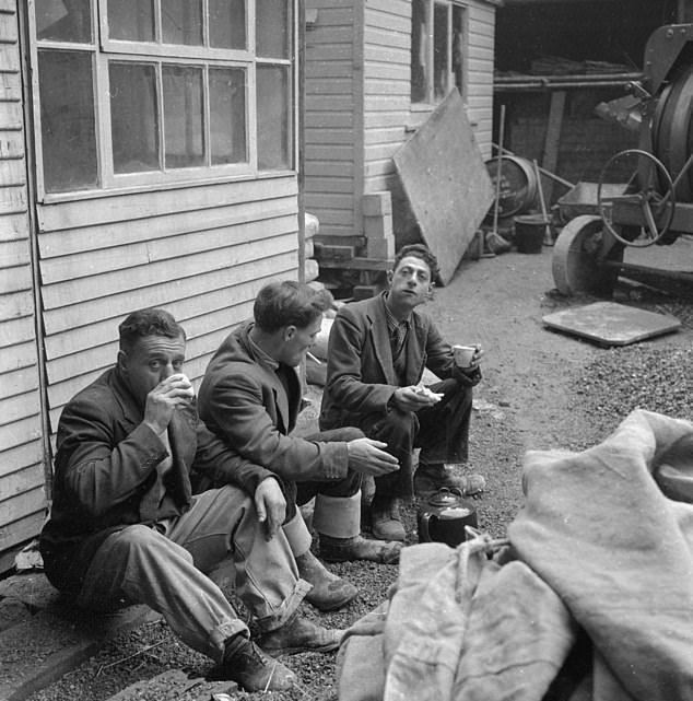 British workers have a tea break in the 1950s.  For generations, the humble cup of tea has been synonymous with Britishness;  it is the liquid heartbeat of the country