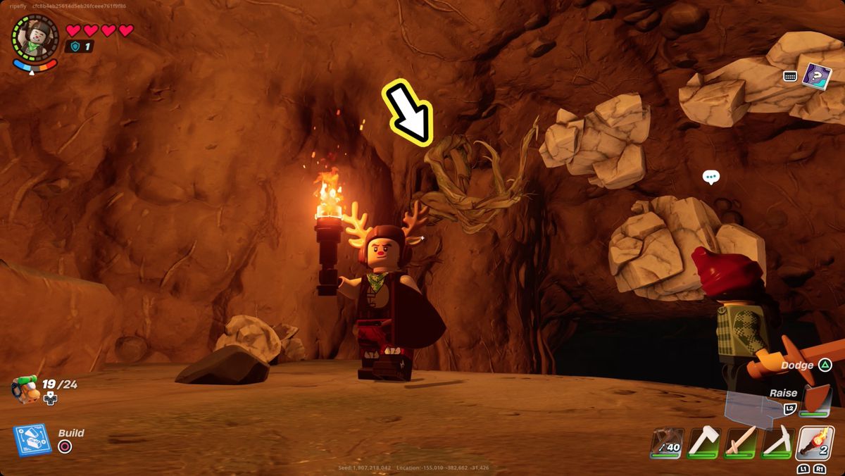 Lego Fortnite player in a cave near some marble and knotroot