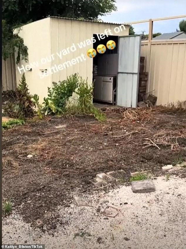 Mrs Bilston was shocked to find the back garden covered in soil and mulch with weeds growing out of the ground (pictured) after the former owner removed all the plants.