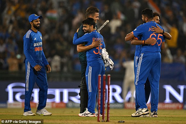 Relieved Indian players celebrate after concluding the five-match T20 series against Australia following their World Cup loss