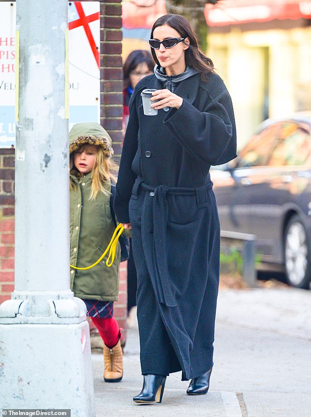 Irina Shayk proved she's a doting mom to both her daughter and her puppy when she treated them to a walk in New York on Tuesday